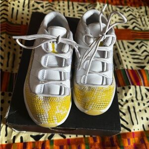 Jordan White and Yellow High-Top Sneakers